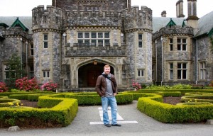 Kyle Mitchell stands in front of his university